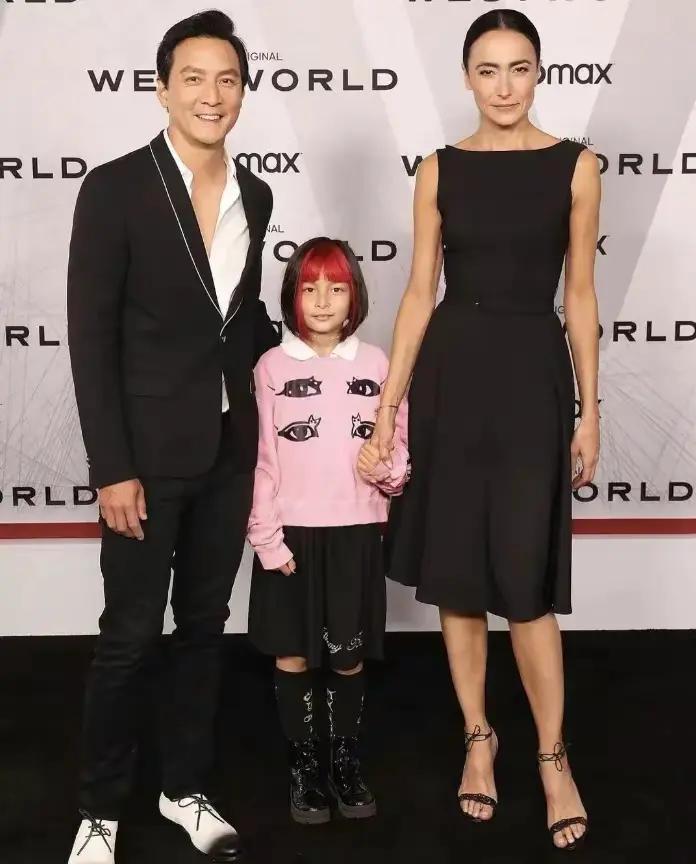 Daniel Wu with his wife and daughter at an event